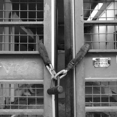 Padlocked metal gate